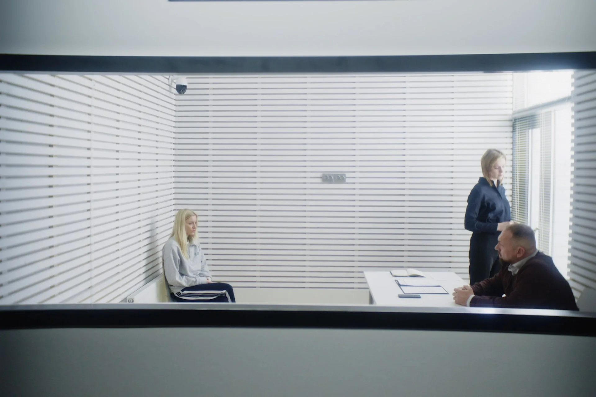 Interrogation room scene with Ania Nova - film still