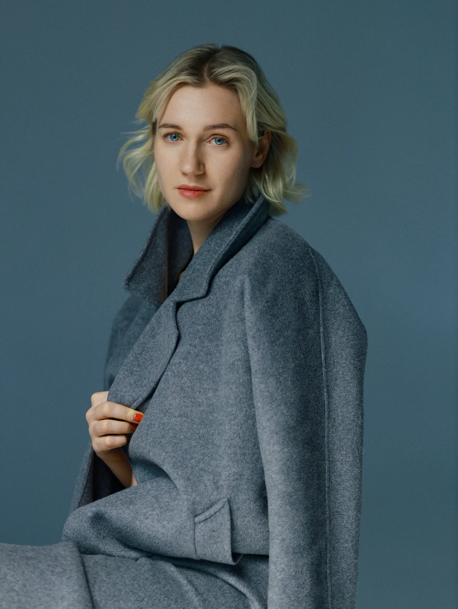 Ania Nova portrait in a grey wool coat